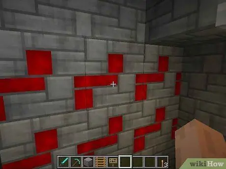 צור לפידים מהבהבים של Redstone בשלב Minecraft