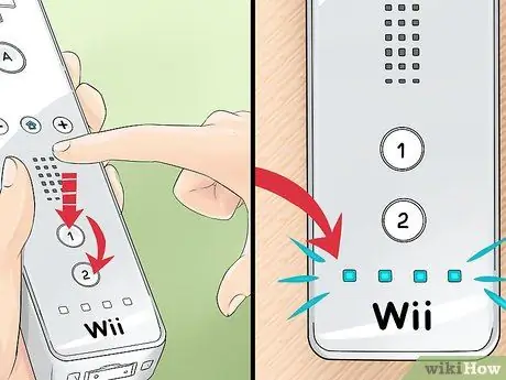 قم بتوصيل Wii Remote Step 21