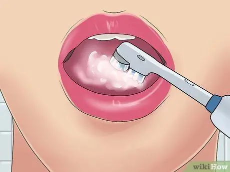 Use an Electric Toothbrush Step 7