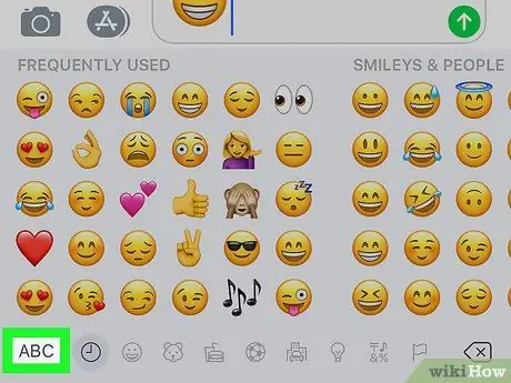 Activeu el teclat d'emoticones Emoji al pas 14 d'iOS