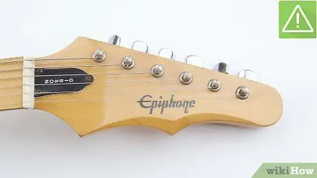 Elektr gitara simlarini o'zgartirish 2 -qadam